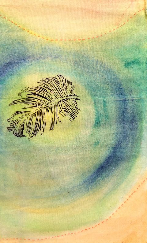 Feather lino print on watercolour-washed calico with dashed red running stitch